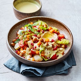 Geroosterde pompoen salade met gebakken kikkererwten en humus Geroosterde pompoen salade met gebakken kikkererwten en humus